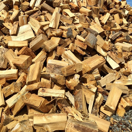 Photo of seasoned pine firewood.
