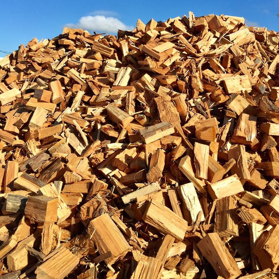 Photo of seasoned macrocarpa firewood.
